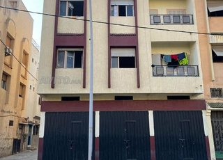 Maison avec 3 magasins