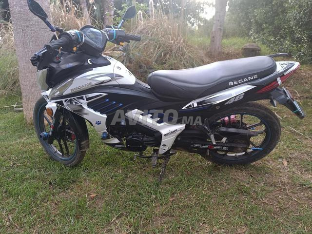 becane 46 motor ba9i nadi kart criz kharja