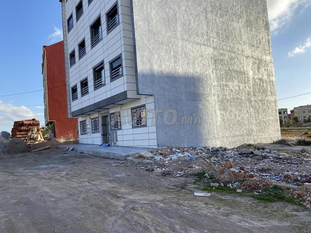 Terrain résidentiel, sous-sol plus 3 étages