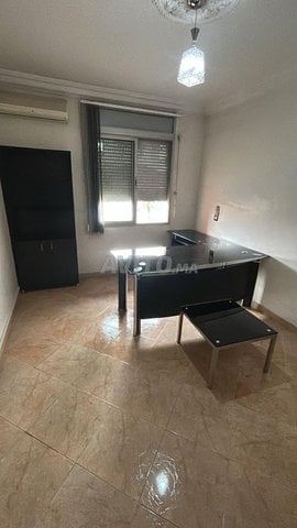 Bureau d’angle en verre trempé noir 