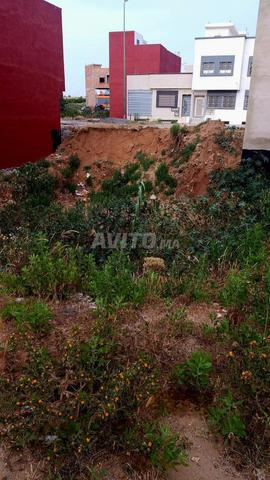 ارض منزل ر،1 100م مسجلة ومحفظة