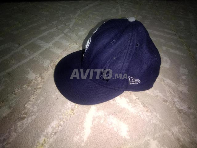 baseball cap (new era) with MBL logo in the back