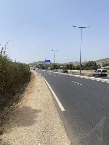 ارض محفظة  3565 متر طريق تطوان قرب قنطرة ملوسة   