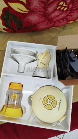 Tire lait electrique medela