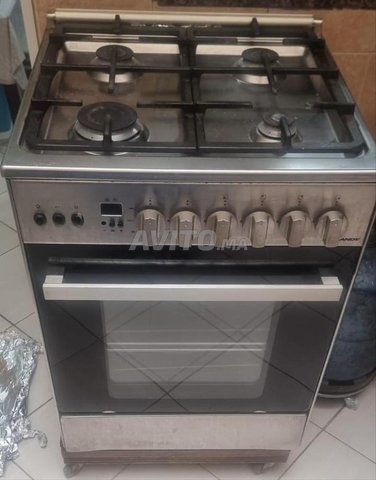 Cuisinière CANDY 4 feux INx