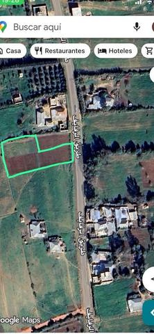 أرض استثمارية للبيع خارج المدينة على طريق مُعبد