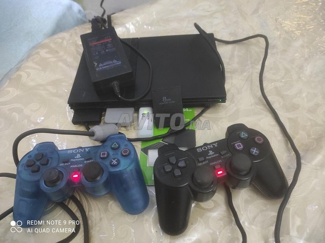 ps2 slim topi n9awa usb64 gb fiha 21 lo3ba 