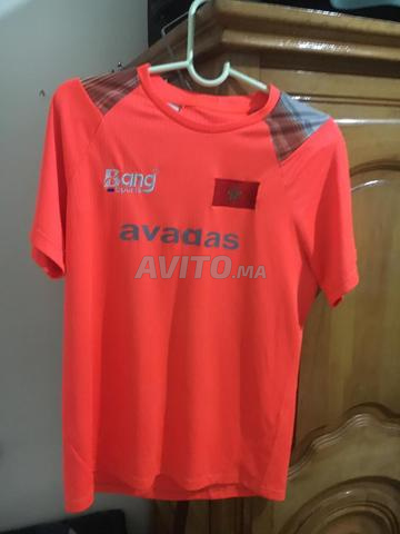 قميص للعب كرة القدم إضافة لرائحة مجانية من عندي 