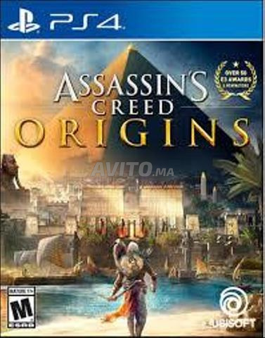 PS4 et 2 manettes (Fifa 20/Ass.creed Origiins) - 2