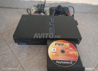 بلي ستيشن 2 بذراعين وبجميع الأسلاك 