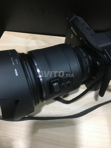  Nikon 1 V1  Avec obj 10-100mm etat Comme Neuf 