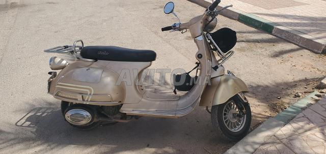 moto retro roma (vespa) italo