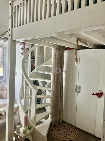 Mezzanine en bois avec dressing et escalier