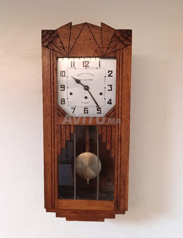 horloge murale mécanique en bon  état 