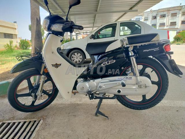 moteu highland en très bon état