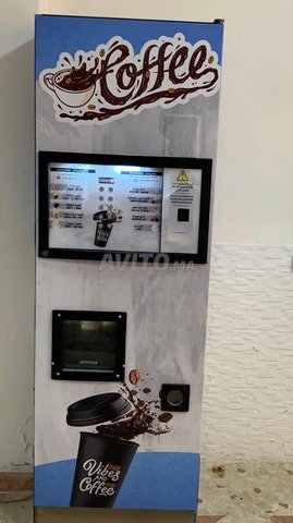 Distributeur de café avec cage en bon état 