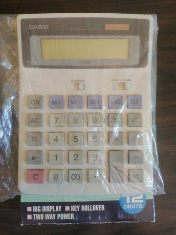 Calculatrice Casio DM 1200WE neuve 