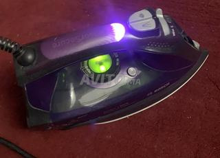 مصلوح الملابس Réparateur de vêtements