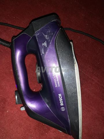 مصلوح الملابس Réparateur de vêtements - 2