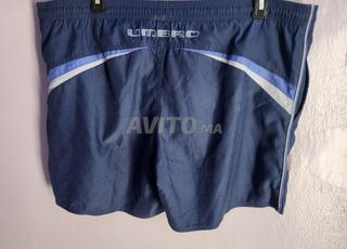 شورط رياضي من ماركةumbro original tail L