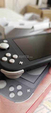 Switch lite neuve avec la boîte
