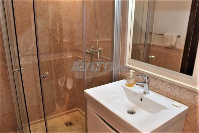 résidence Ennaim grand piscine sale de sport  - 2