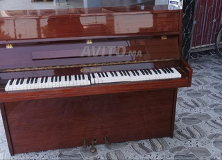 piano en bois naturel foctionne bien