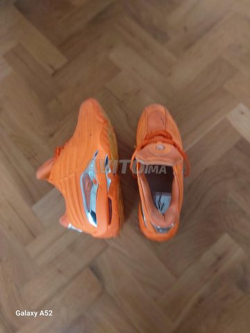 nike nocta orange très bon état de pointure 40