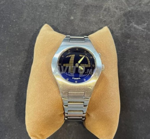 Montre fossil type TIK TAK