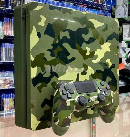 Ps4 Slim avec 100 jeux