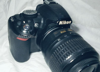 كاميرا من نوع. Nikon d3100