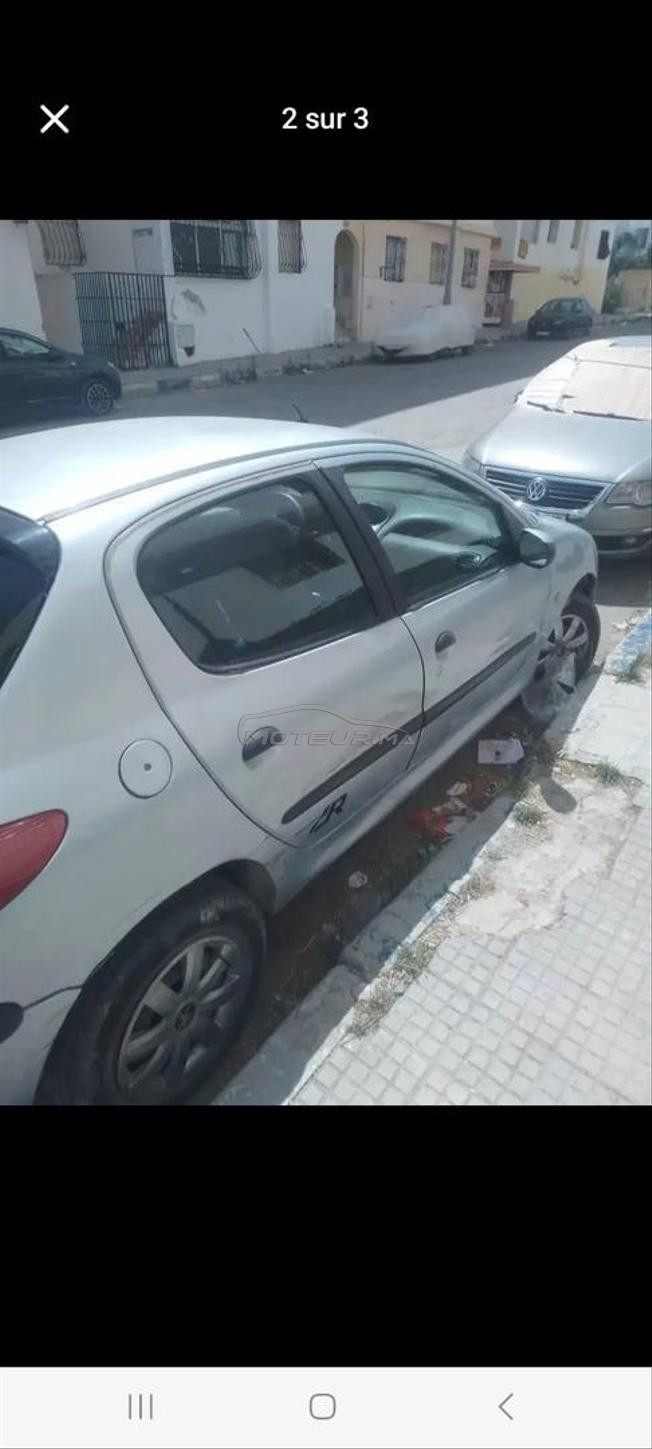 بيجو 206 نقية واقتصادية ضريبة 700 موديل 2003 206