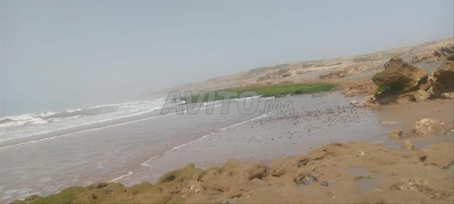 ارض 2000م مطلة على البحر  للبيع  صويرة طريق اسفي