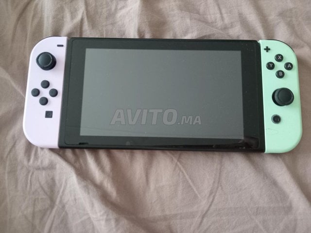 Nintendo Switch  des accessoires et des jeux