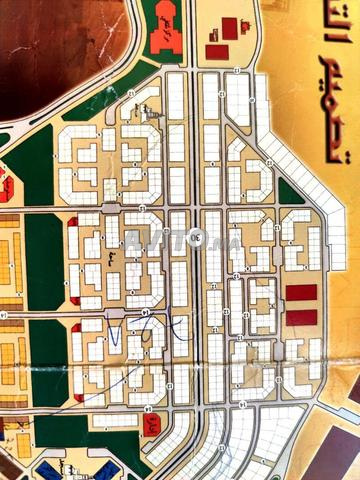 Terrain 100m² tamouda taboula - 2