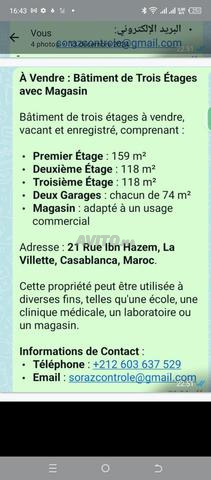 immeuble 3 étages vide deux magasins