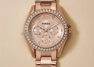 montre fossil femme en doré rose ES2811