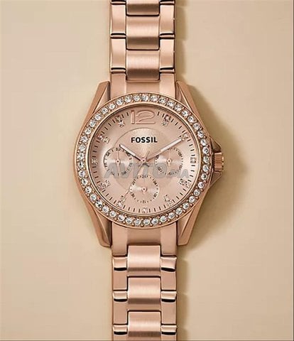 montre fossil femme en doré rose ES2811