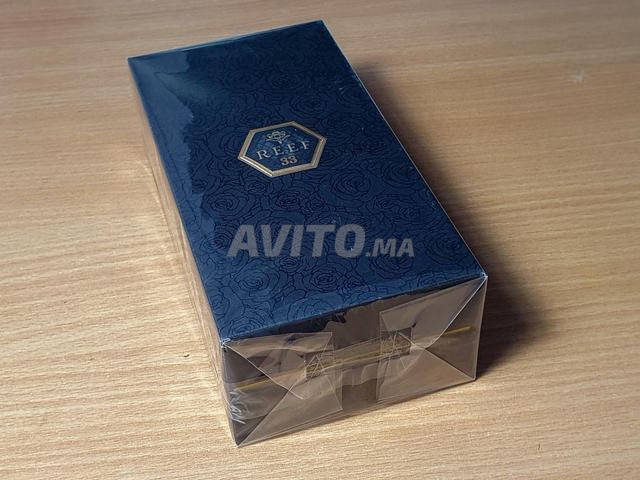 Reef 33 عطر شرقي خشبي للجنسين 100 مل