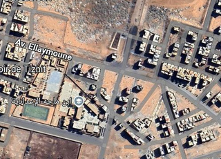 قرب سوق الخميس الأسبوعي بقع أرضية للبيع تيزنيت 