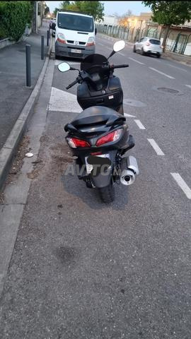 av burgman 125 dewana  - 2