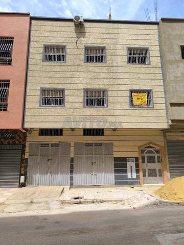 Maison à vendre 134m² avec 2 étages et 2 garages.