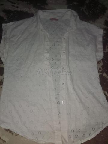 شوميز (بلوزة) وردية فاتح اللون يميل للأبيض صيفية 