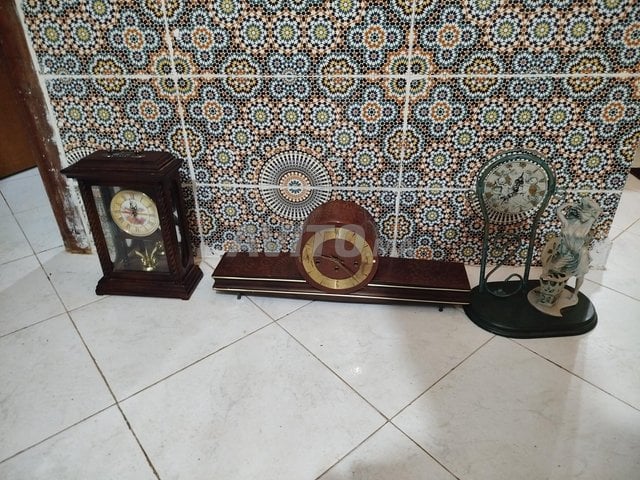 trois horloge antique