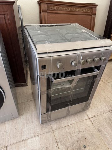 cuisinière Candy 4 feux