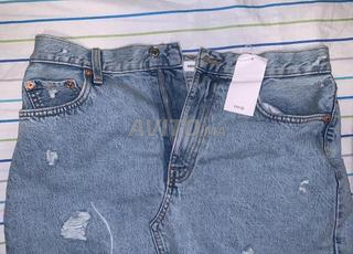 mini jupe marque MANGO taille L etat