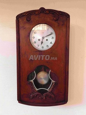 horloge mécanique murale en bon état 
