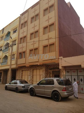 Maison de rapport avec 3 appartement et garage 