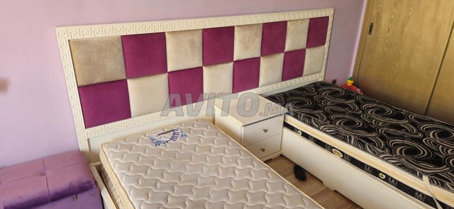 Chambre à coucher enfant avec 2 lits