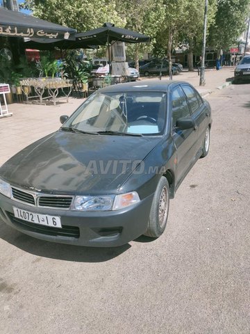 Mitsubishi lancer essence 